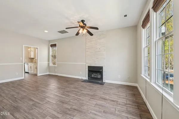 a kitchen with sink cabinets and window