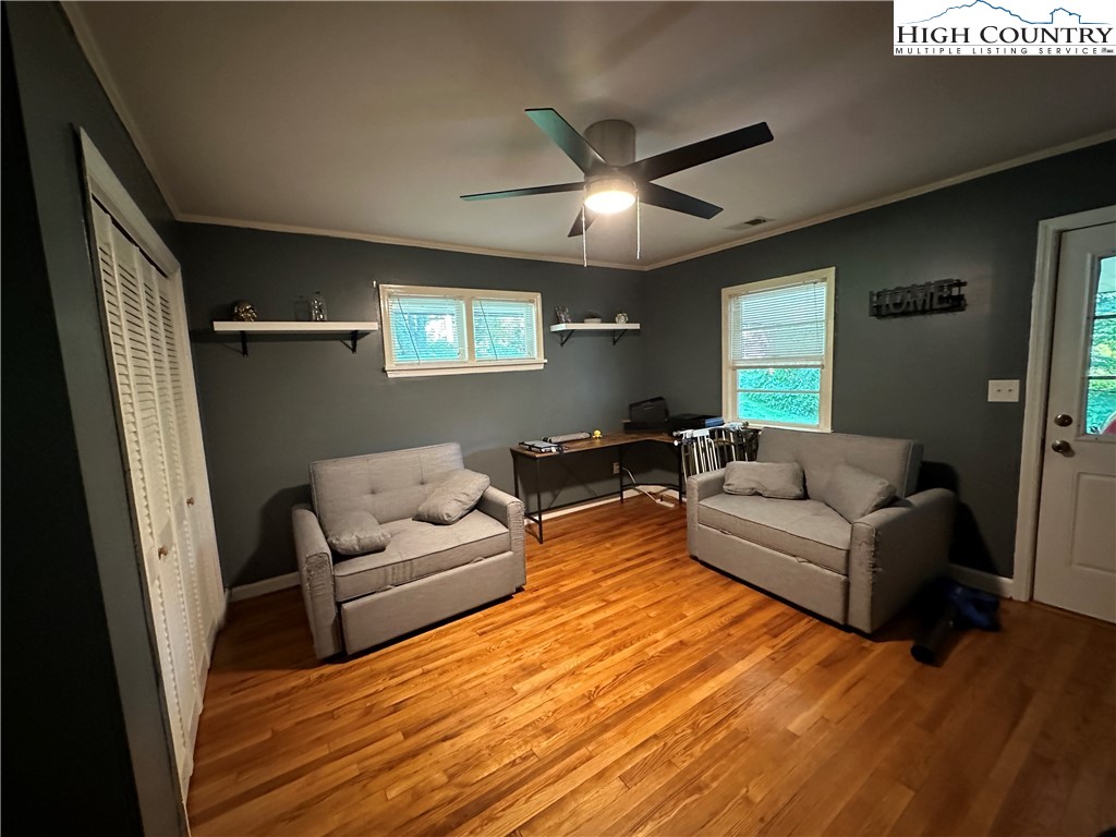 320 North Main Street Jefferson, NC 28640 - Photo 14 of 28 a living room with furniture and a large window