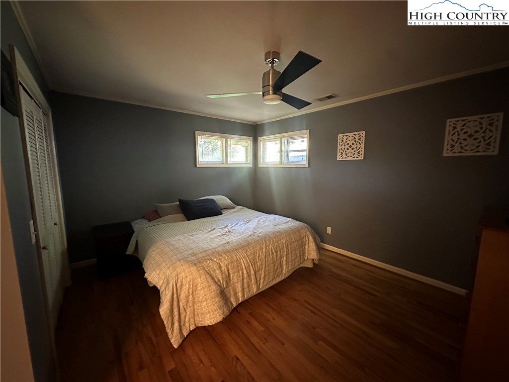 320 North Main Street Jefferson, NC 28640 - Photo 22 of 28 a bedroom with bed and window
