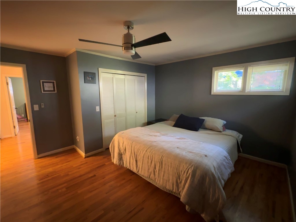 320 North Main Street Jefferson, NC 28640 - Photo 23 of 28 a bedroom with a bed and a window