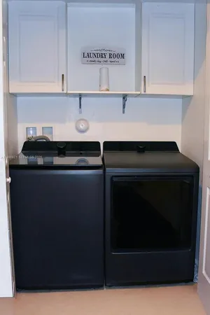 a kitchen with a stove and cabinets
