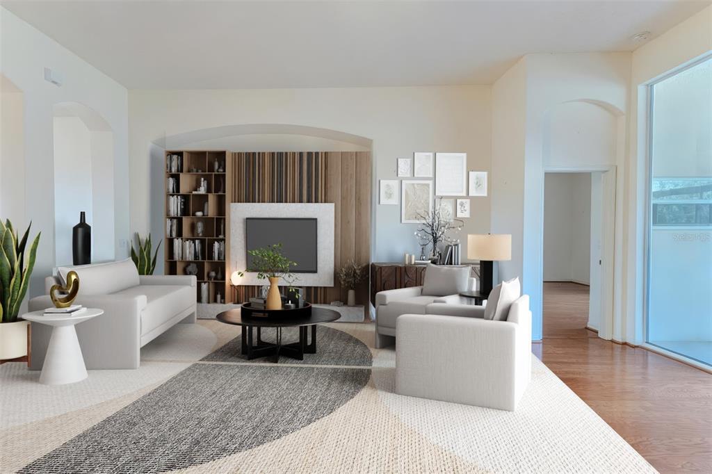 239 Longleaf Court Spring Hill, FL 34609 - Photo 14 of 55 a living room with furniture and a large window