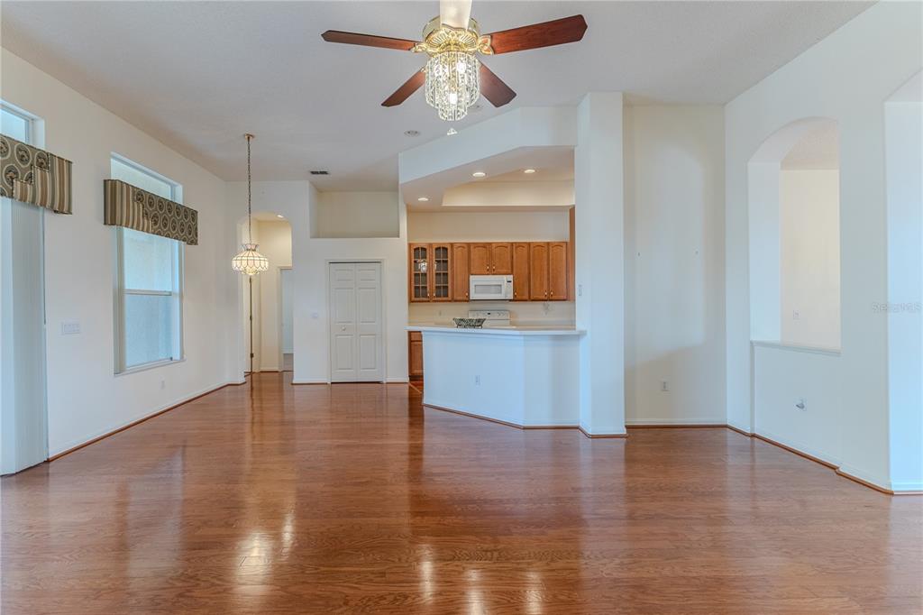 239 Longleaf Court Spring Hill, FL 34609 - Photo 19 of 55 a view of a kitchen with wooden floor and a kitchen space