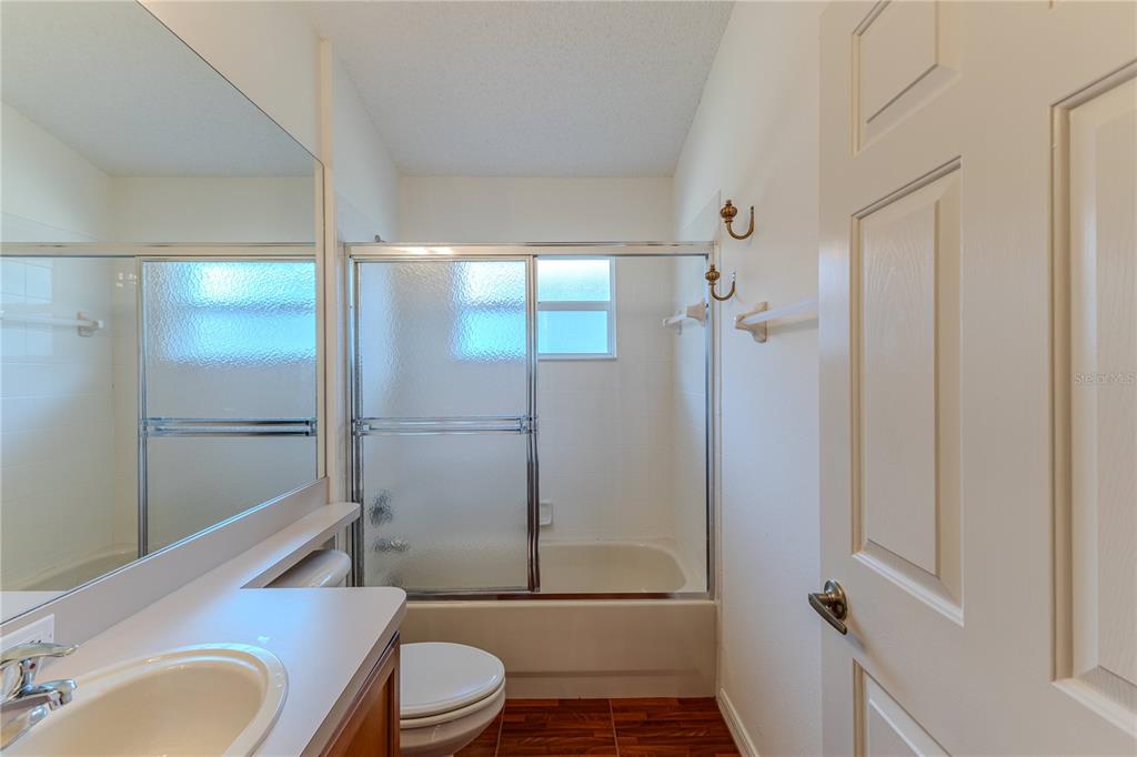 239 Longleaf Court Spring Hill, FL 34609 - Photo 37 of 55 a bathroom with a toilet and a shower