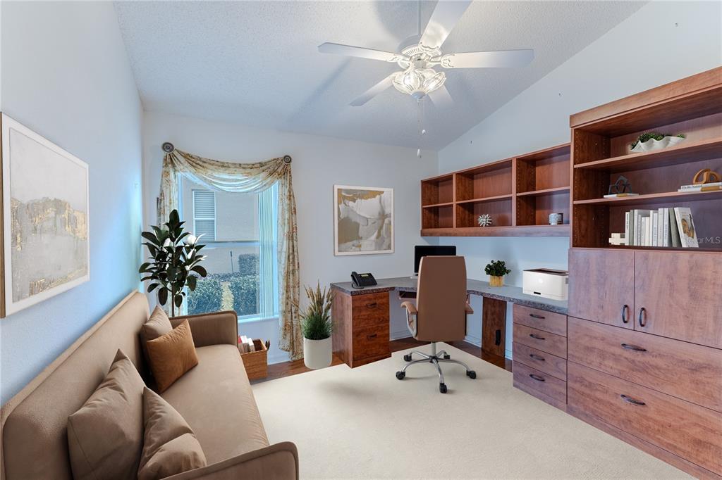 239 Longleaf Court Spring Hill, FL 34609 - Photo 39 of 55 a living room with furniture potted plant and a window