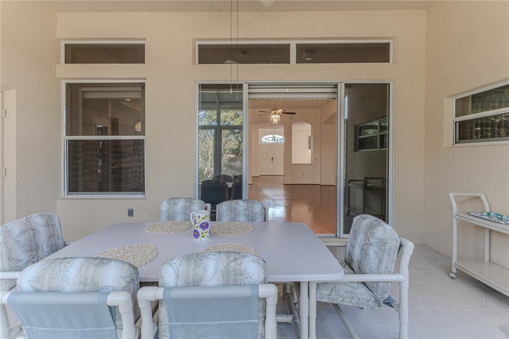 239 Longleaf Court Spring Hill, FL 34609 - Photo 47 of 55 a view of a dining room with furniture and window