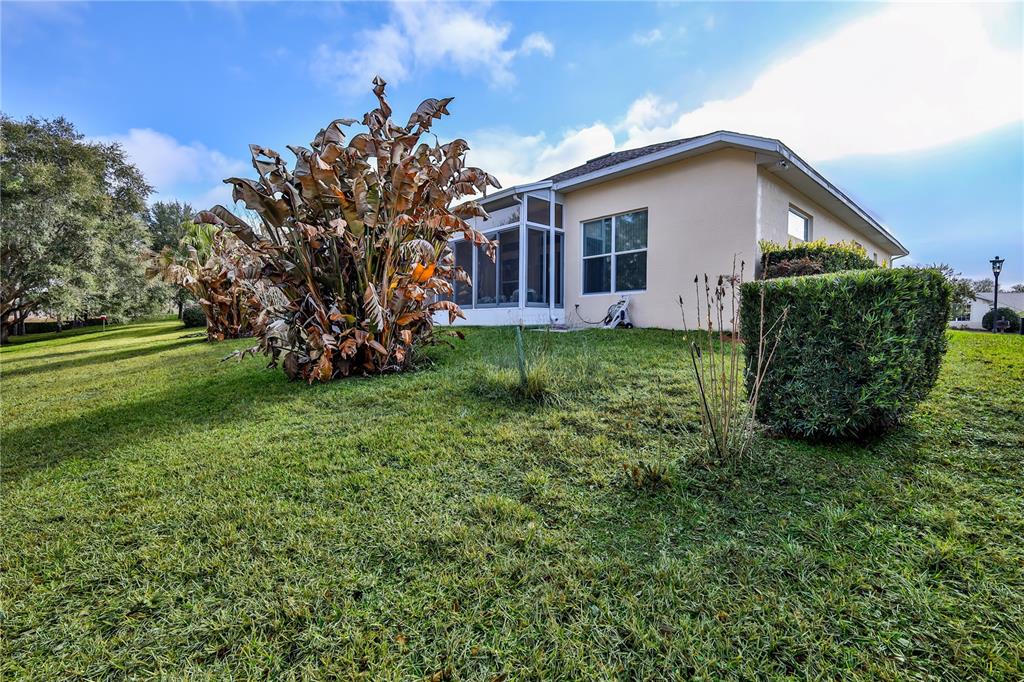 239 Longleaf Court Spring Hill, FL 34609 - Photo 53 of 55 a view of a house with a big yard
