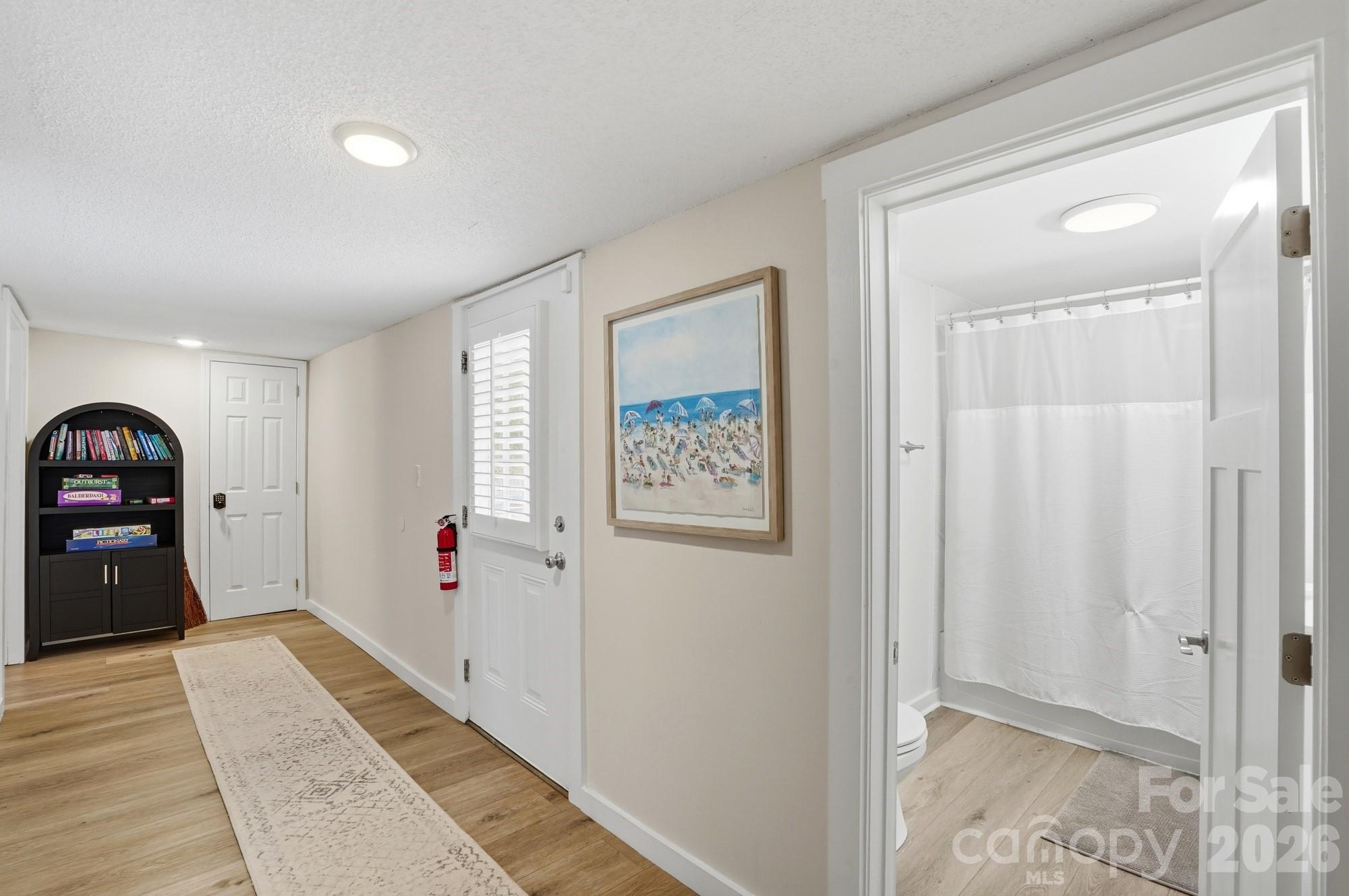 128 Massey Street Fort Mill, SC 29715 - Photo 15 of 29 a view of a hallway with a bedroom