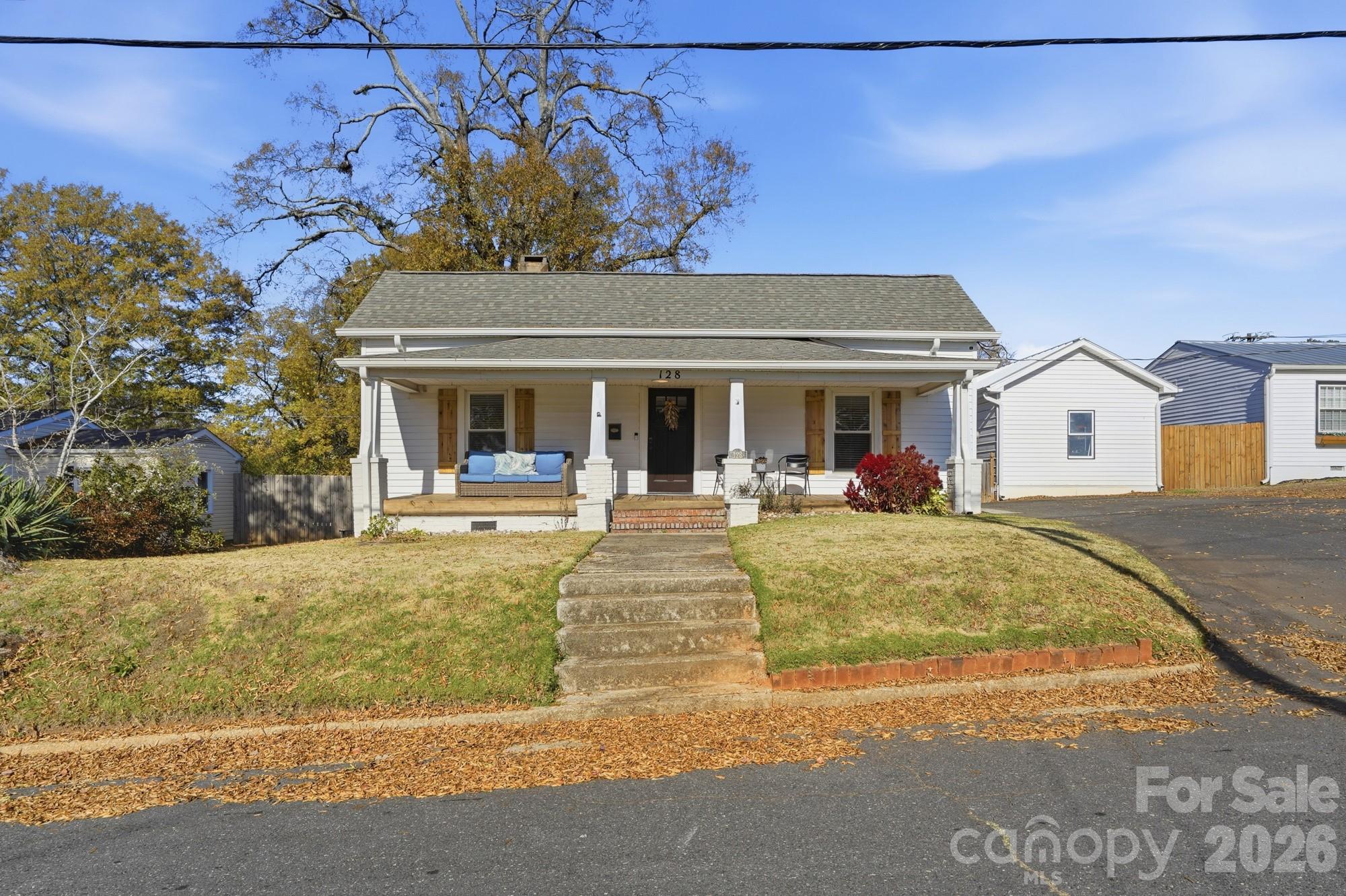 128 Massey Street Fort Mill, SC 29715 - Photo 2 of 29 a view of a white house with swimming pool in front of it