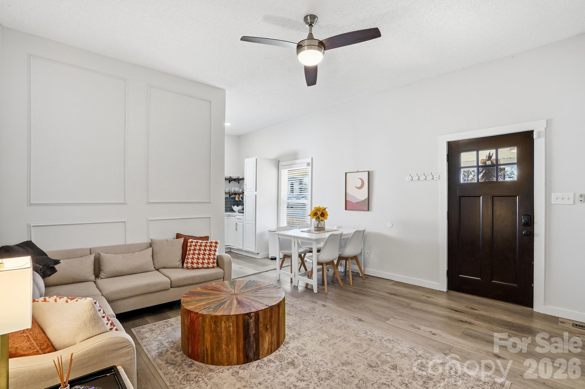 128 Massey Street Fort Mill, SC 29715 - Photo 5 of 29 a living room with furniture and a dining table