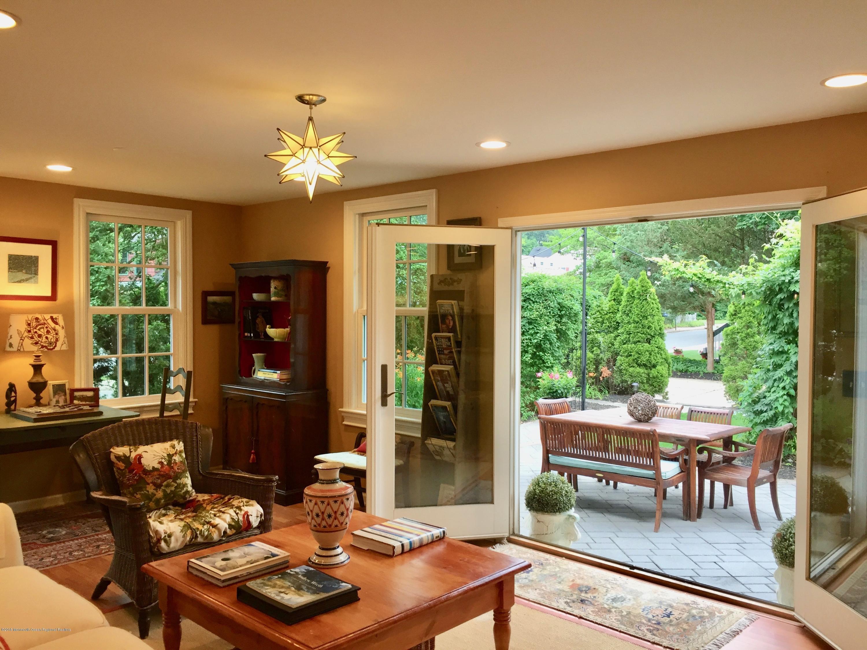 668 River Road Fair Haven, NJ 07704 - Photo 12 of 68 a living room with furniture and a large window