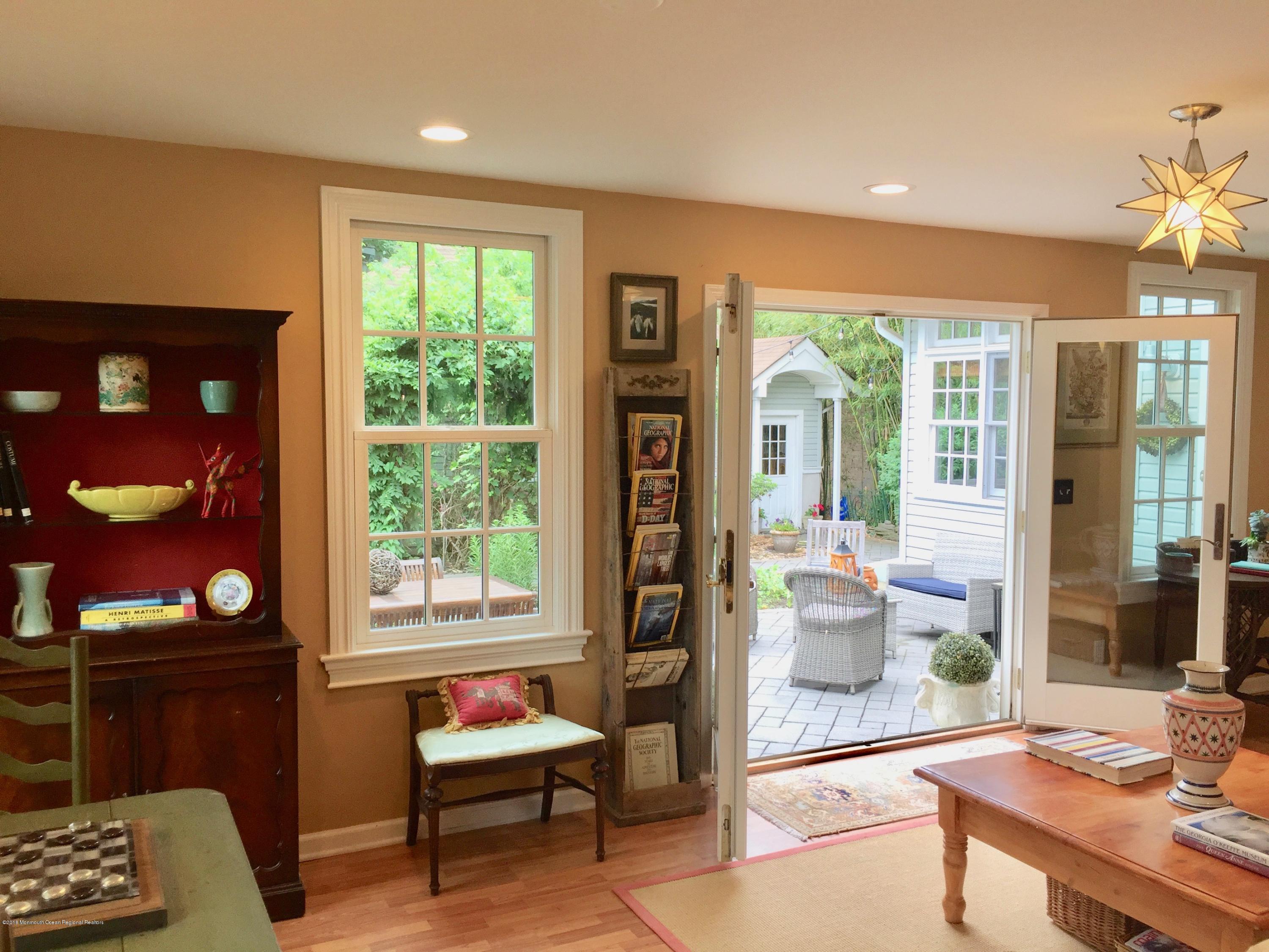 668 River Road Fair Haven, NJ 07704 - Photo 13 of 68 a living room with furniture and a window