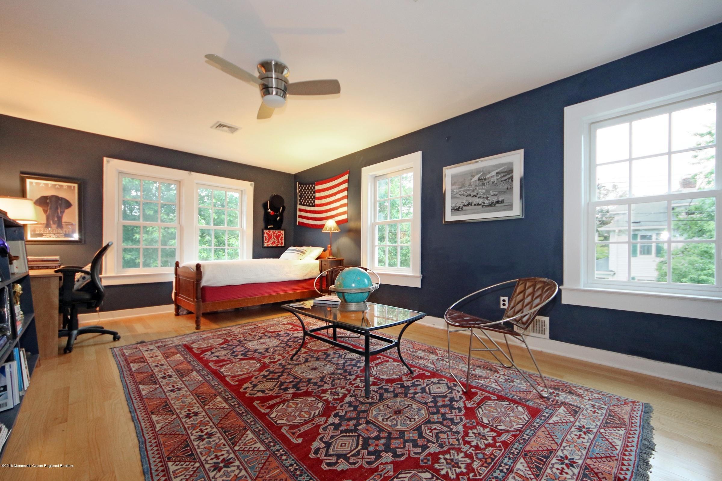 668 River Road Fair Haven, NJ 07704 - Photo 46 of 68 a living room with furniture and a window