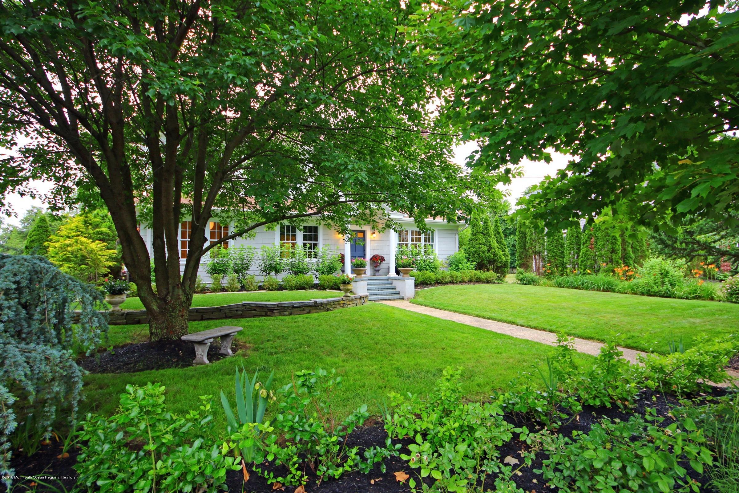 668 River Road Fair Haven, NJ 07704 - Photo 5 of 68 a view of a park with large trees