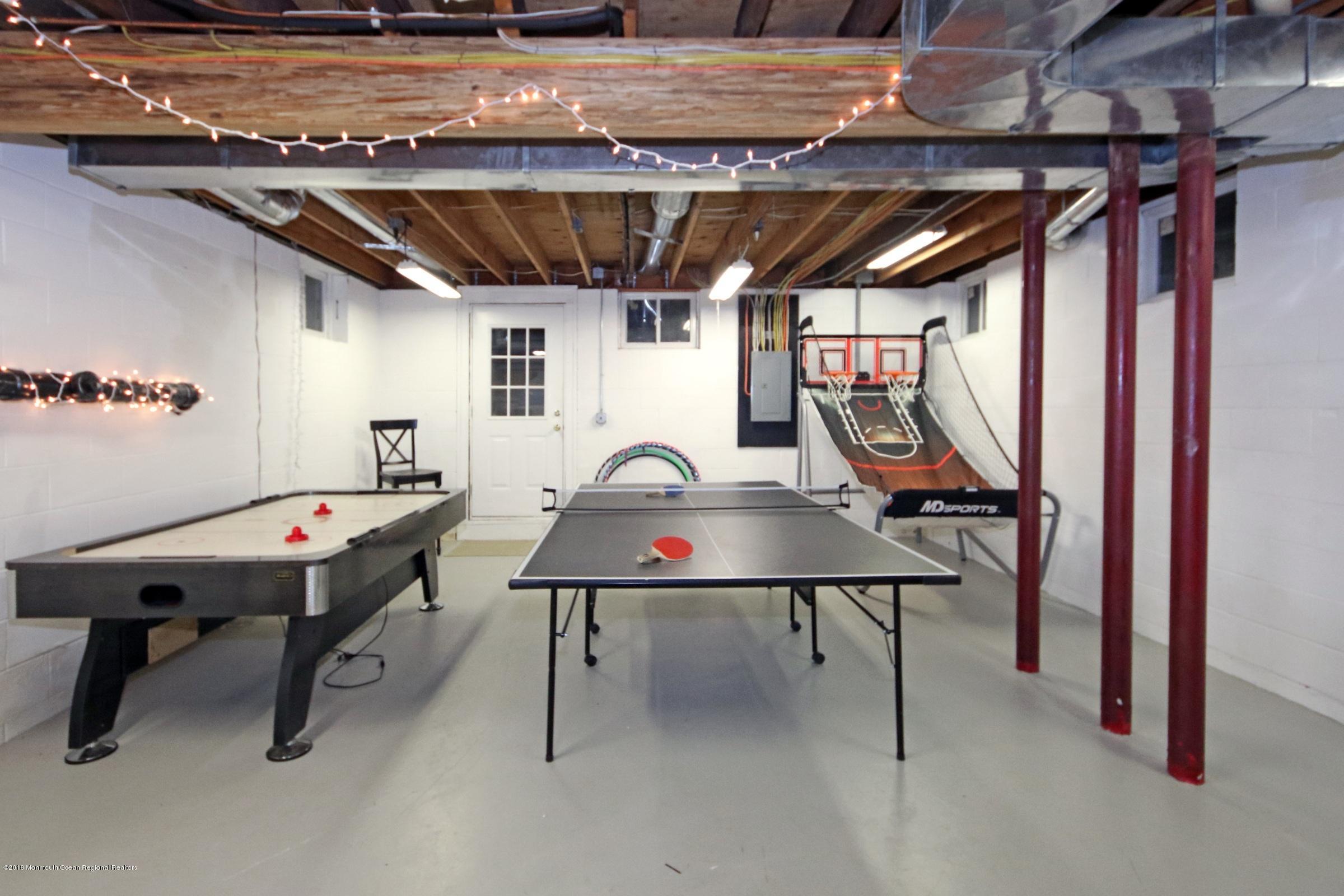 668 River Road Fair Haven, NJ 07704 - Photo 54 of 68 a view of a room with gym equipment