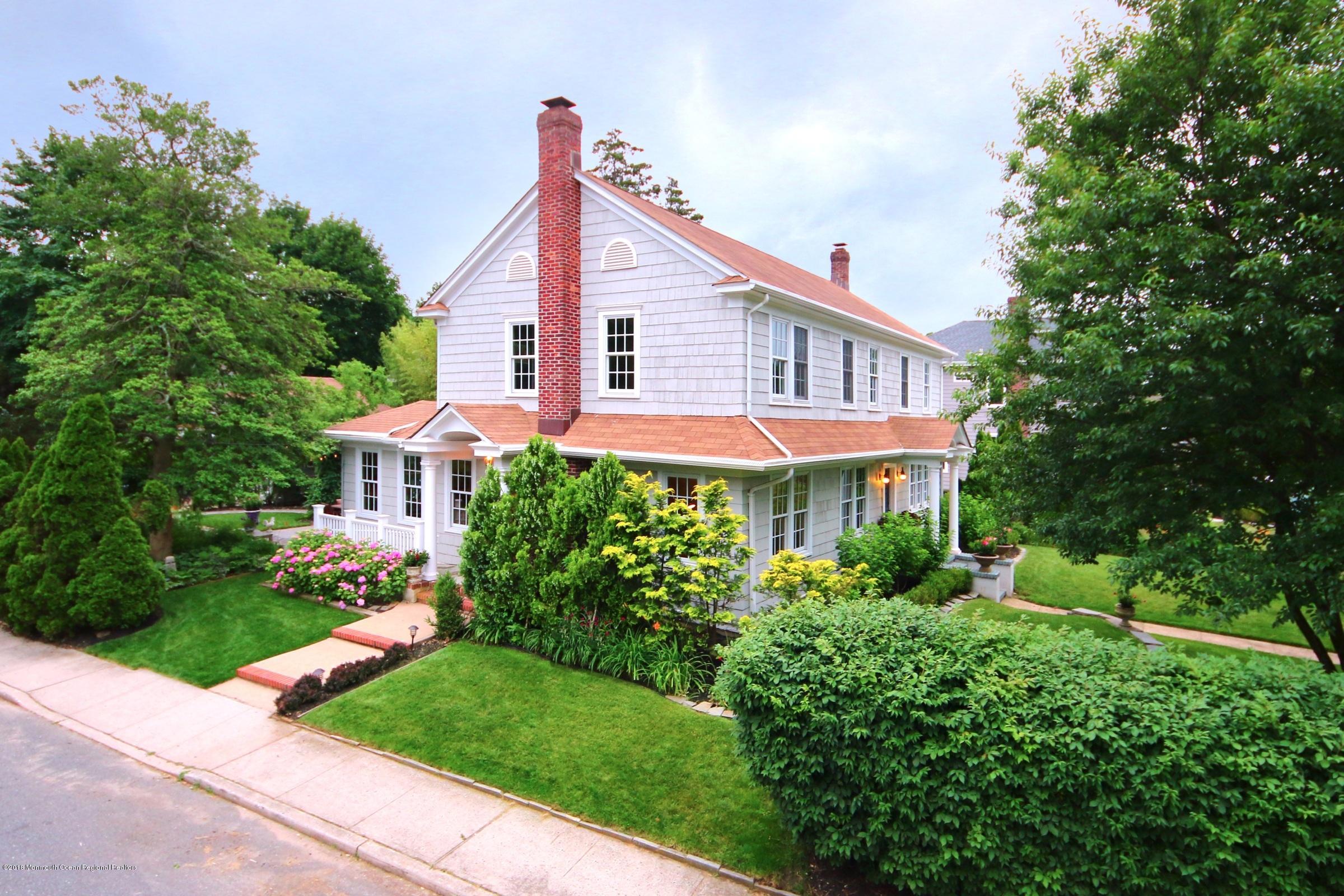 668 River Road Fair Haven, NJ 07704 - Photo 8 of 68 a view of a house with yard and plants
