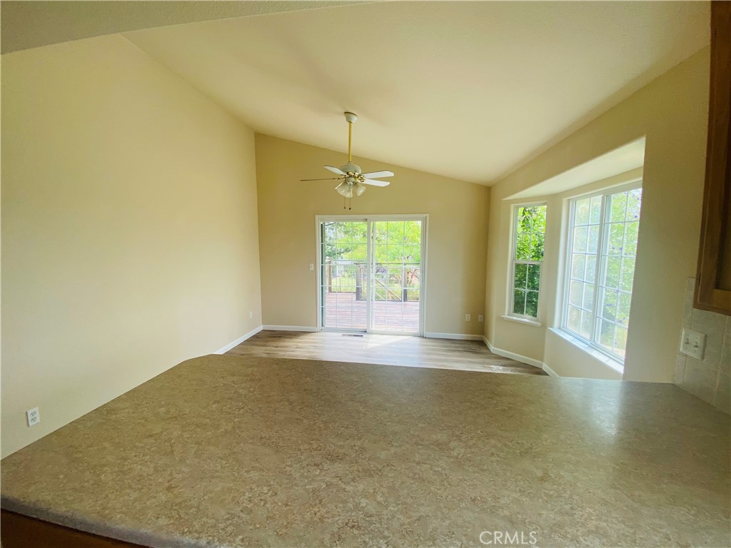 16506 Ridgecrest Court Hidden Valley Lake, CA 95467 - Photo 8 of 25 a view of empty room with floor to ceiling window