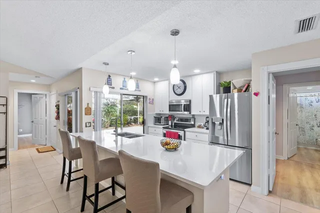 $295,000 | 1819 Southwest Waterfall Boulevard, Palm City, FL 34990