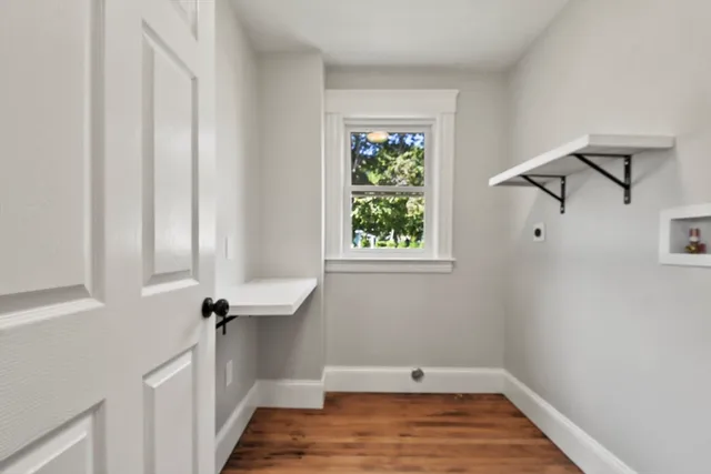 a view of a room with racks on the wall