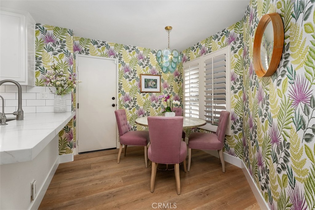 90 Cameray Heights Laguna Niguel, CA 92677 - Photo 12 of 36 a view of a dining room with furniture and chandelier