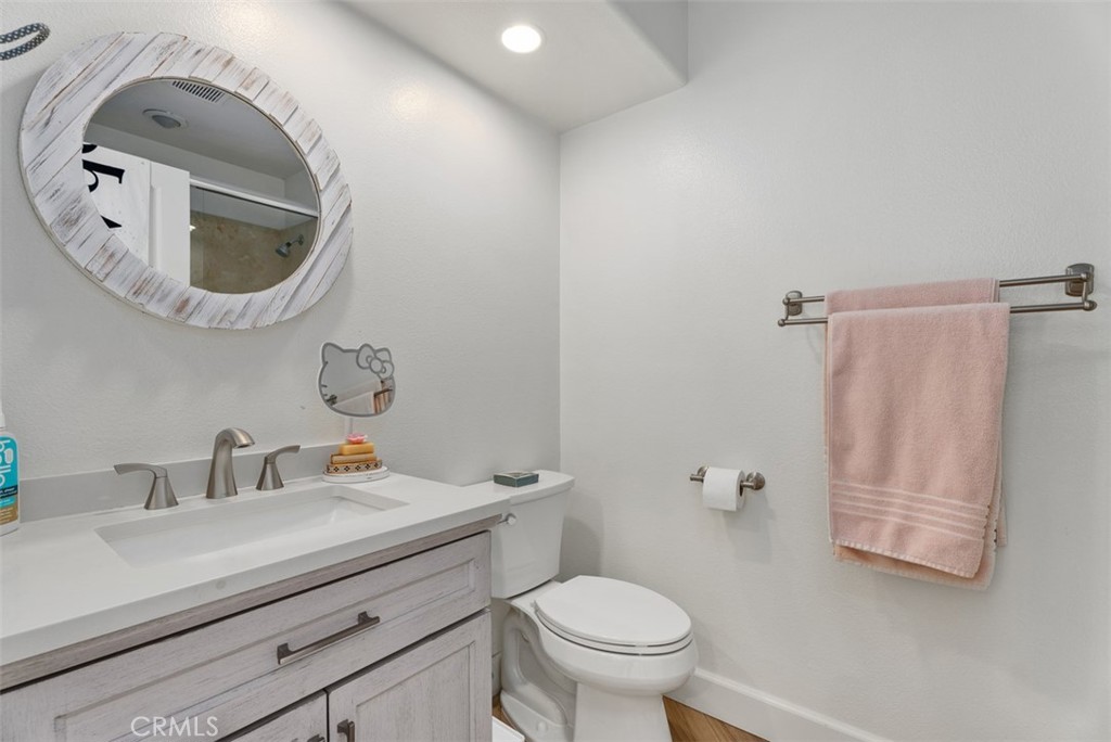 90 Cameray Heights Laguna Niguel, CA 92677 - Photo 20 of 36 a bathroom with a sink mirror and toilet