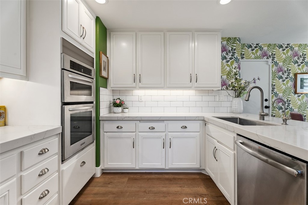 90 Cameray Heights Laguna Niguel, CA 92677 - Photo 2 of 36 a kitchen with cabinets stainless steel appliances and a sink