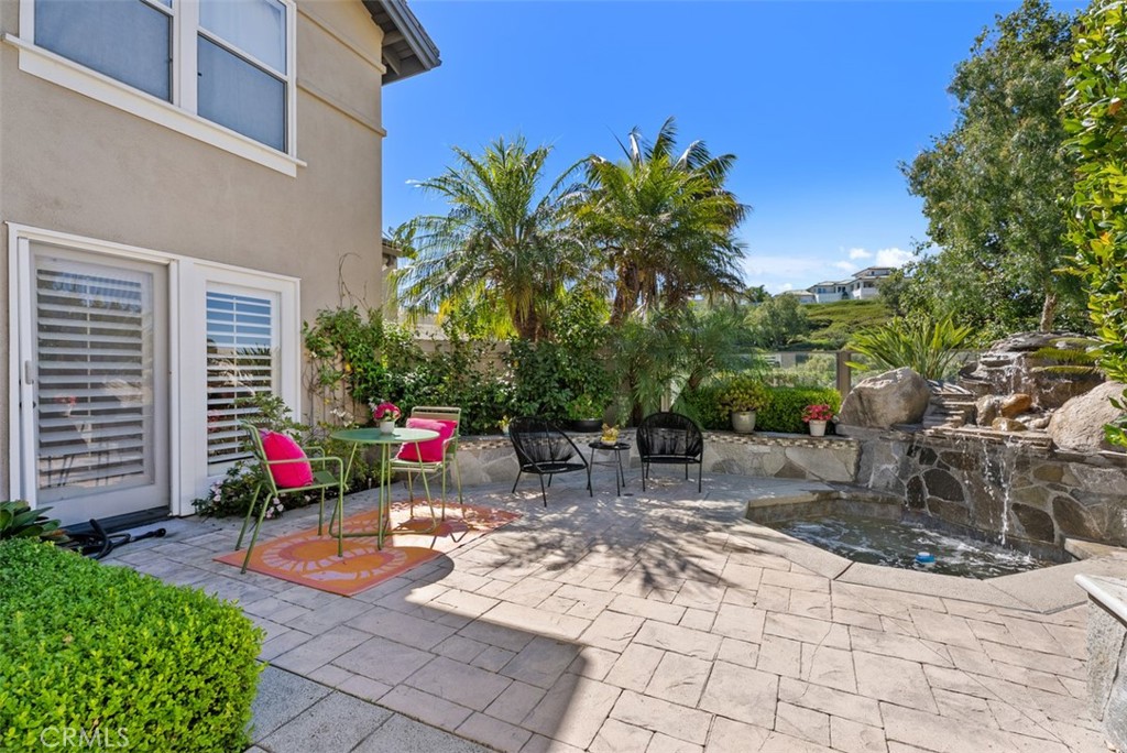 90 Cameray Heights Laguna Niguel, CA 92677 - Photo 23 of 36 a view of a backyard with sitting area