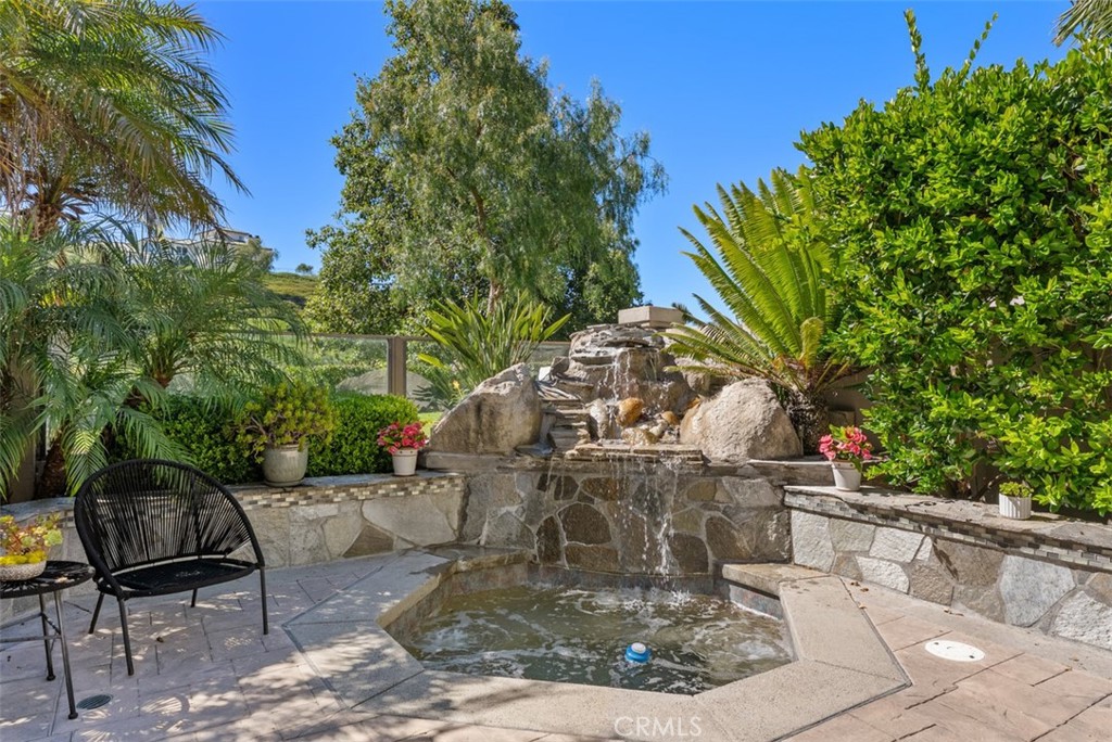 90 Cameray Heights Laguna Niguel, CA 92677 - Photo 24 of 36 a view of a backyard with sitting area