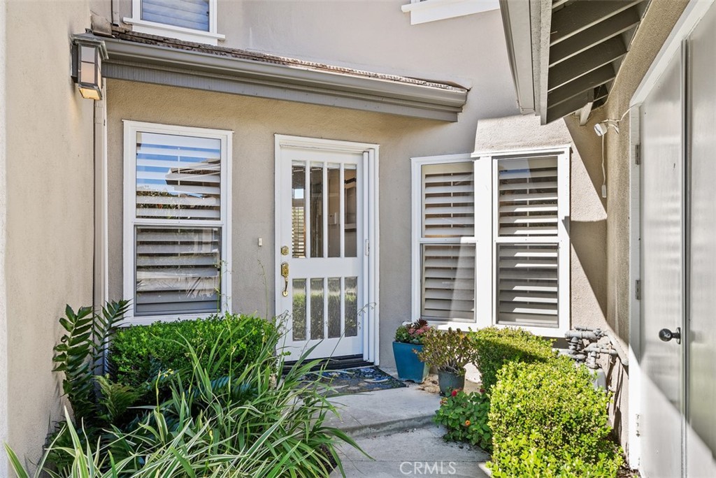 90 Cameray Heights Laguna Niguel, CA 92677 - Photo 28 of 36 a front view of a house with plants