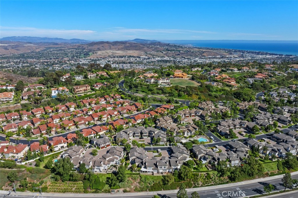 90 Cameray Heights Laguna Niguel, CA 92677 - Photo 32 of 36 an aerial view of residential houses with outdoor space and trees