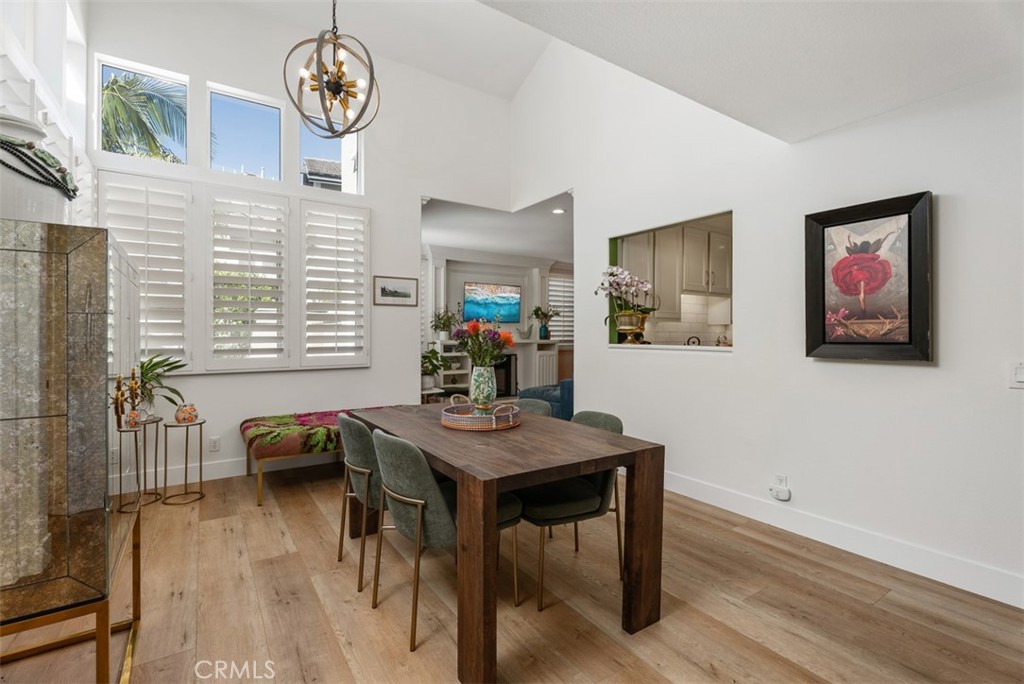 90 Cameray Heights Laguna Niguel, CA 92677 - Photo 4 of 36 a view of a dining room with furniture window and wooden floor