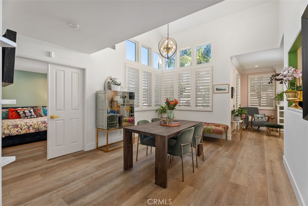 90 Cameray Heights Laguna Niguel, CA 92677 - Photo 9 of 36 a view of a dining room with furniture and wooden floor