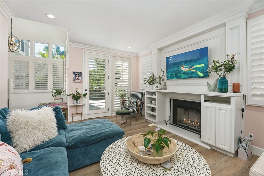 90 Cameray Heights Laguna Niguel, CA 92677 - Photo 10 of 36 a living room with furniture and a fireplace