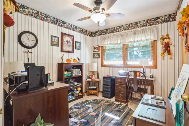a bed room with furniture and a window