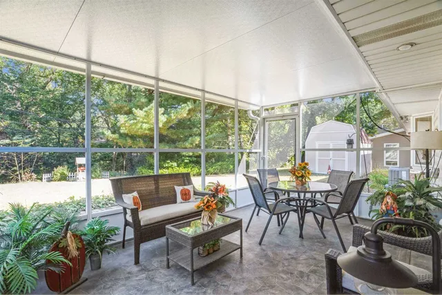 a view of chair and tables in the patio