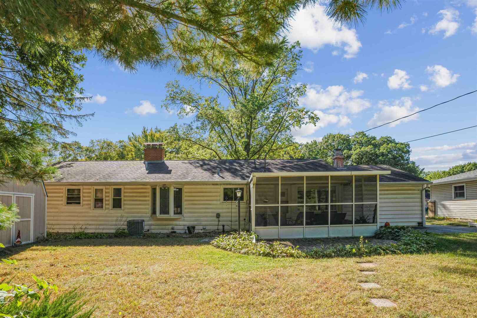 3431 37th Avenue Rock Island, IL 61201 - Photo 23 of 25 a front view of a house with a yard