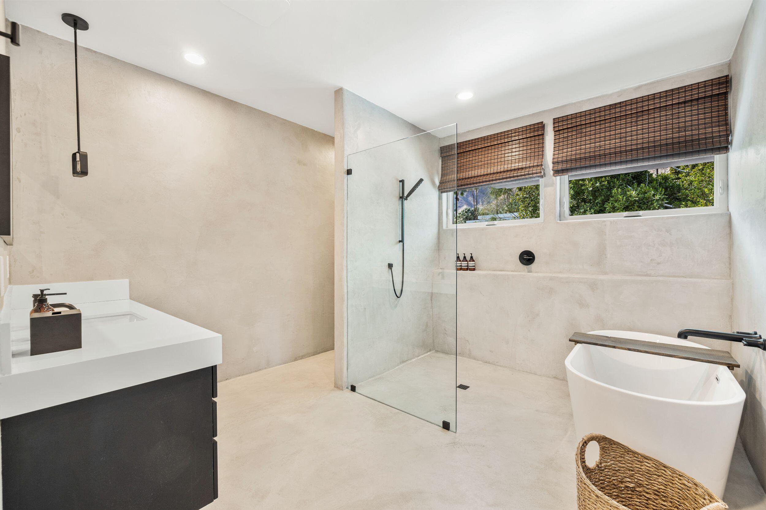 594 West Stevens Road Palm Springs, CA 92262 - Photo 15 of 28 a bathroom with a tub sink and shower