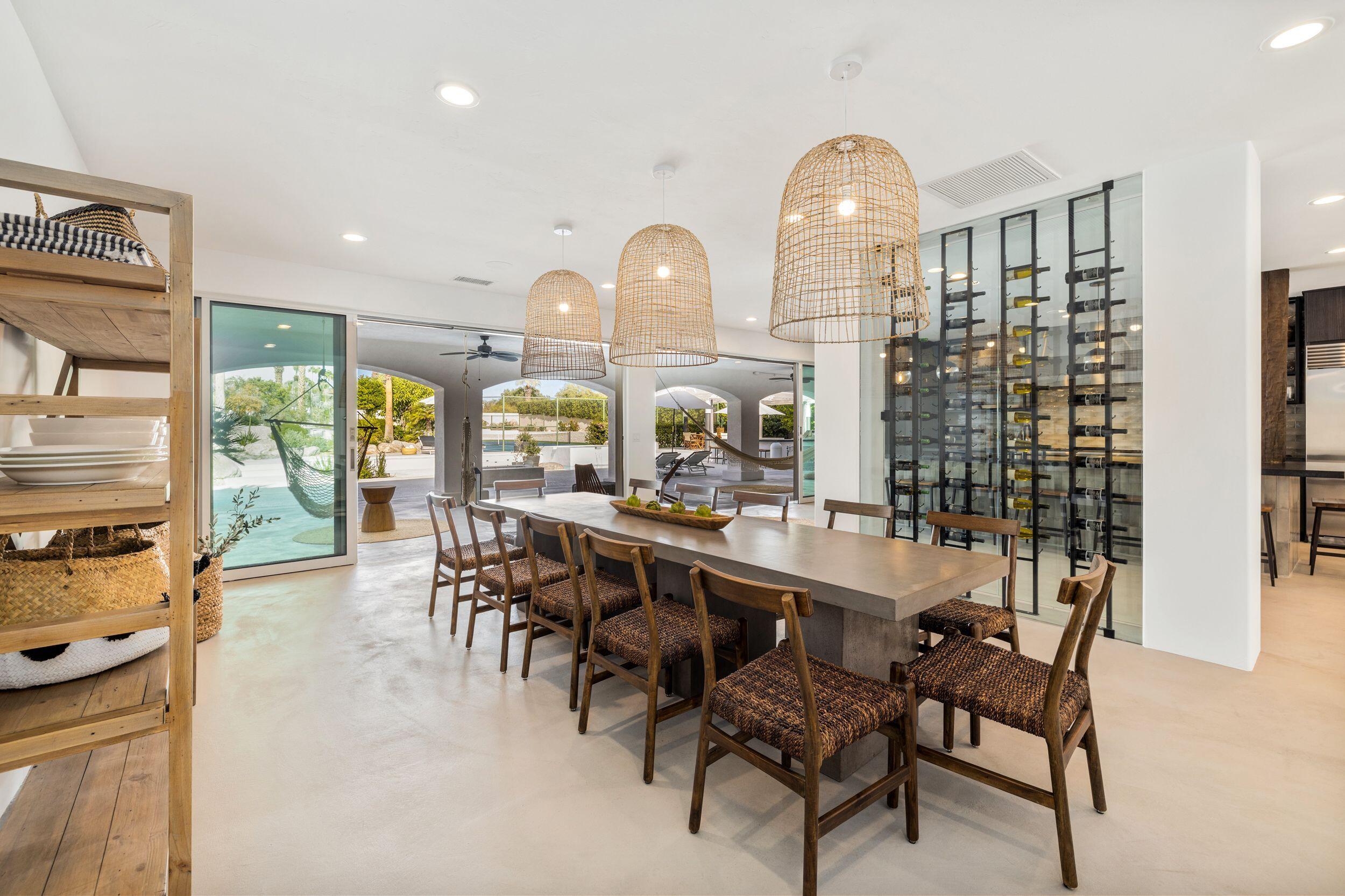594 West Stevens Road Palm Springs, CA 92262 - Photo 9 of 28 a view of a dining room with furniture window and outside view