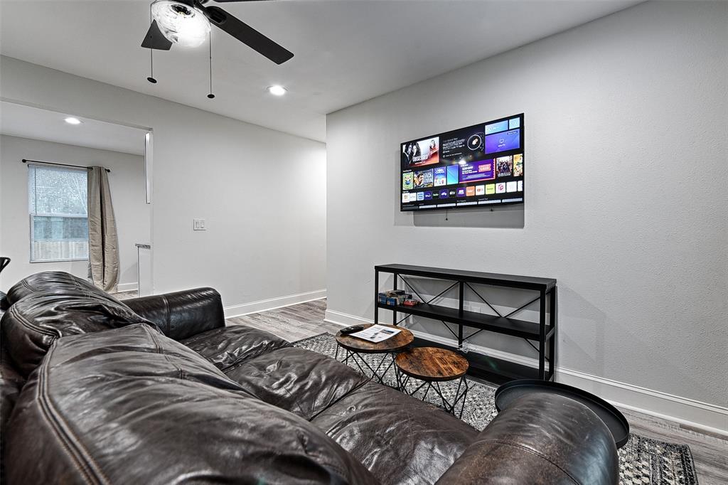 1201 Ridgewood Road Denison, TX 75020 - Photo 13 of 29 Living room featuring wood-type flooring and ceiling fan