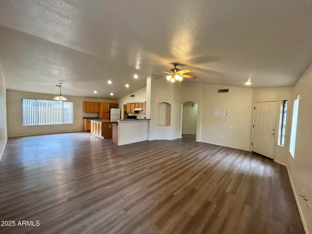 a view of a livingroom with furniture and wooden floor