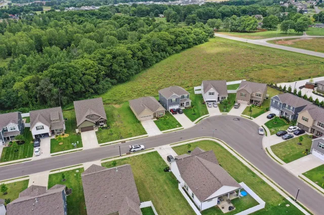 an aerial view of a house with a garden