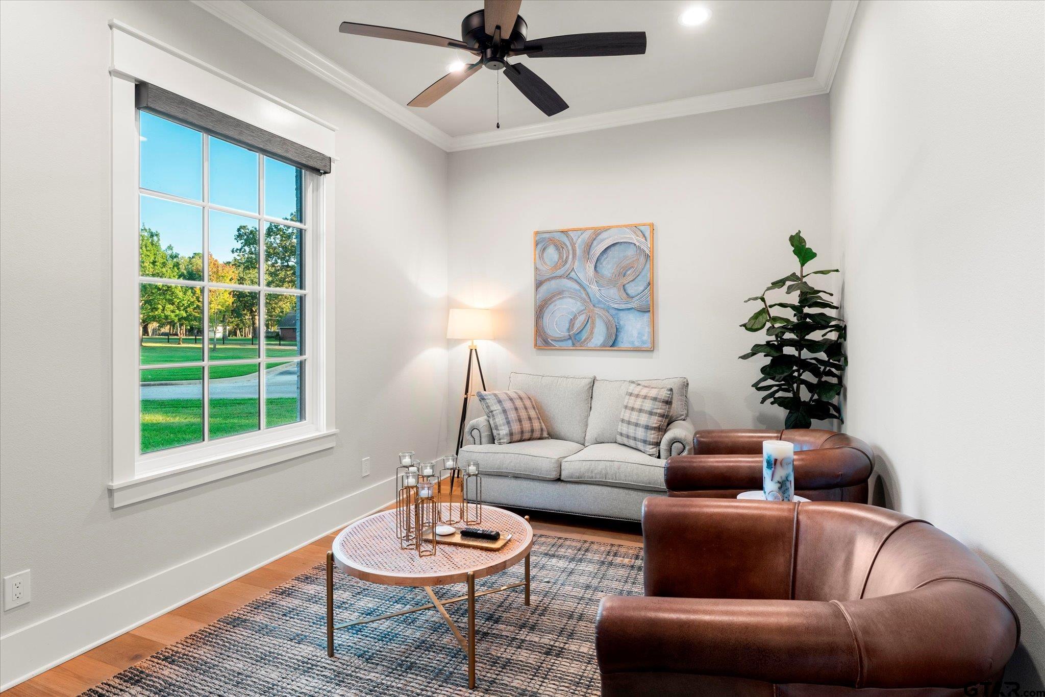 4301 Windrush Boulevard Longview, TX 75604 - Photo 24 of 36 a living room with furniture and a window