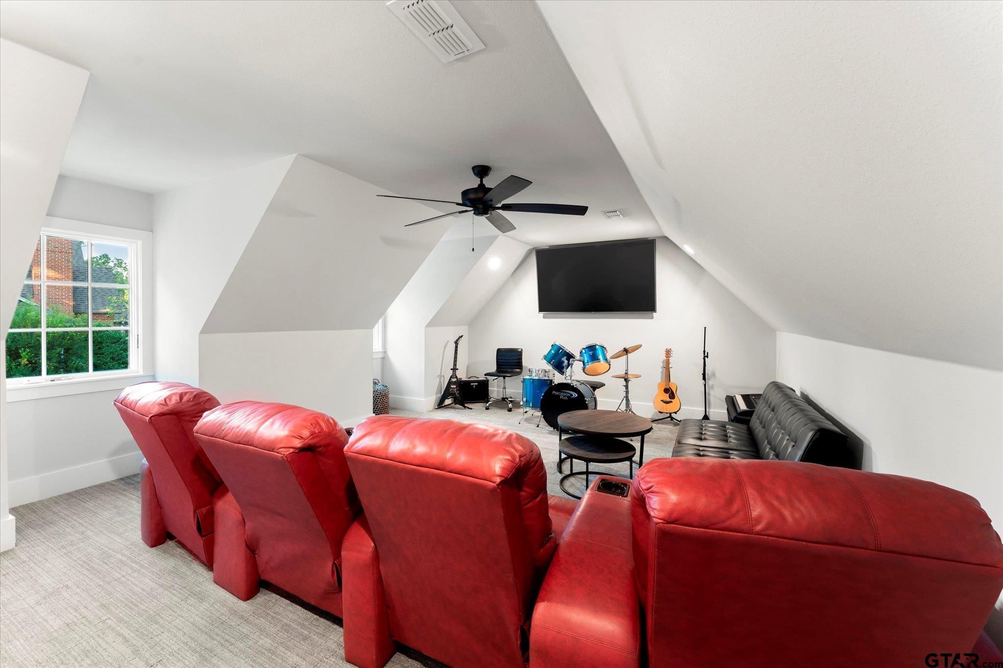 4301 Windrush Boulevard Longview, TX 75604 - Photo 25 of 36 a room with furniture and a flat screen tv