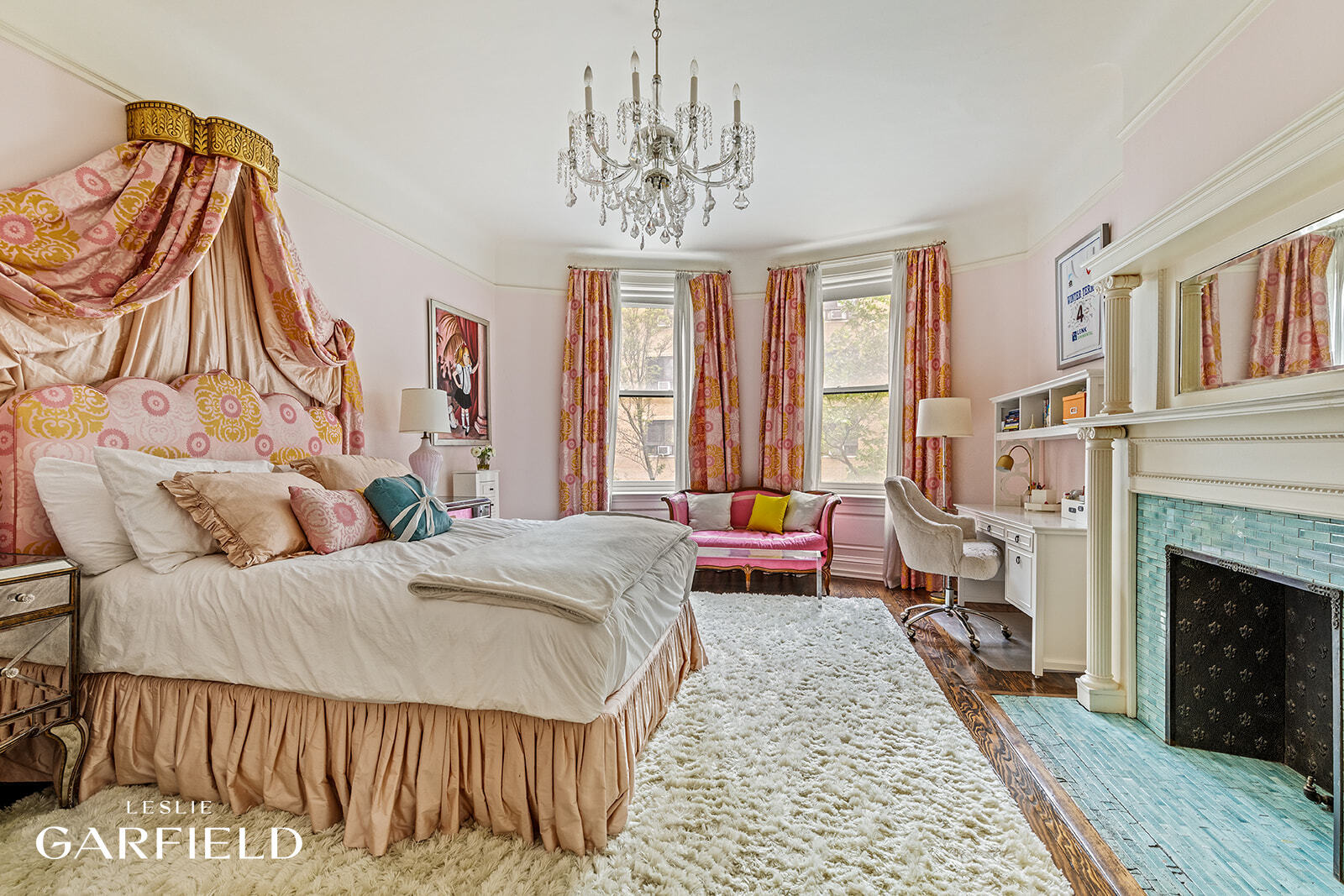 315 West 84th Street Manhattan, NY 10024 - Photo 12 of 20 a bedroom with a bed and a fireplace