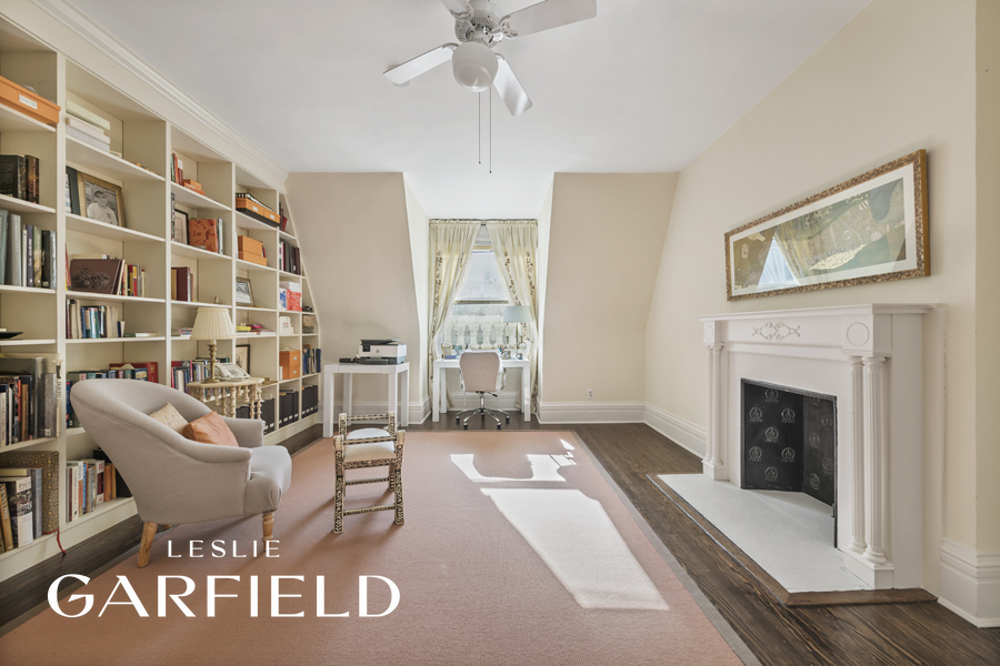315 West 84th Street Manhattan, NY 10024 - Photo 14 of 20 a living room with furniture and a fireplace