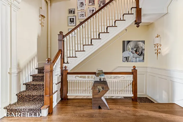 a view of entryway with wooden floor