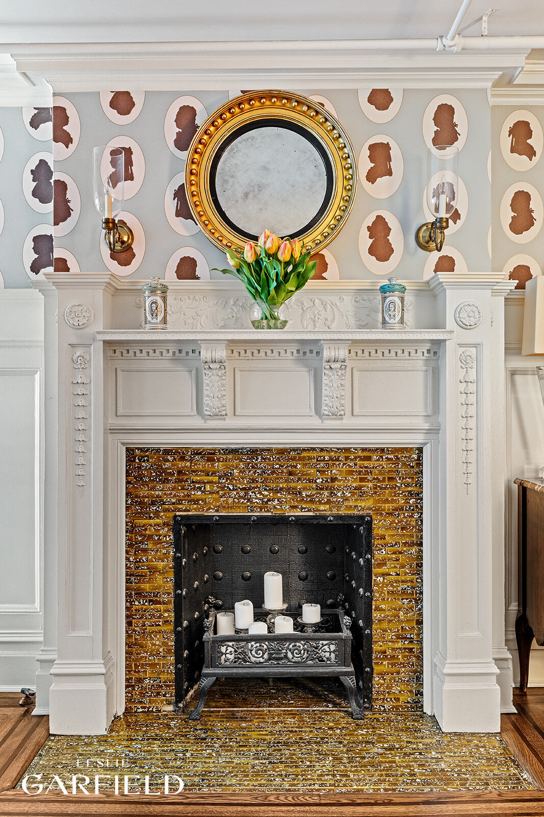 315 West 84th Street Manhattan, NY 10024 - Photo 8 of 20 a fireplace with a clock on top of it
