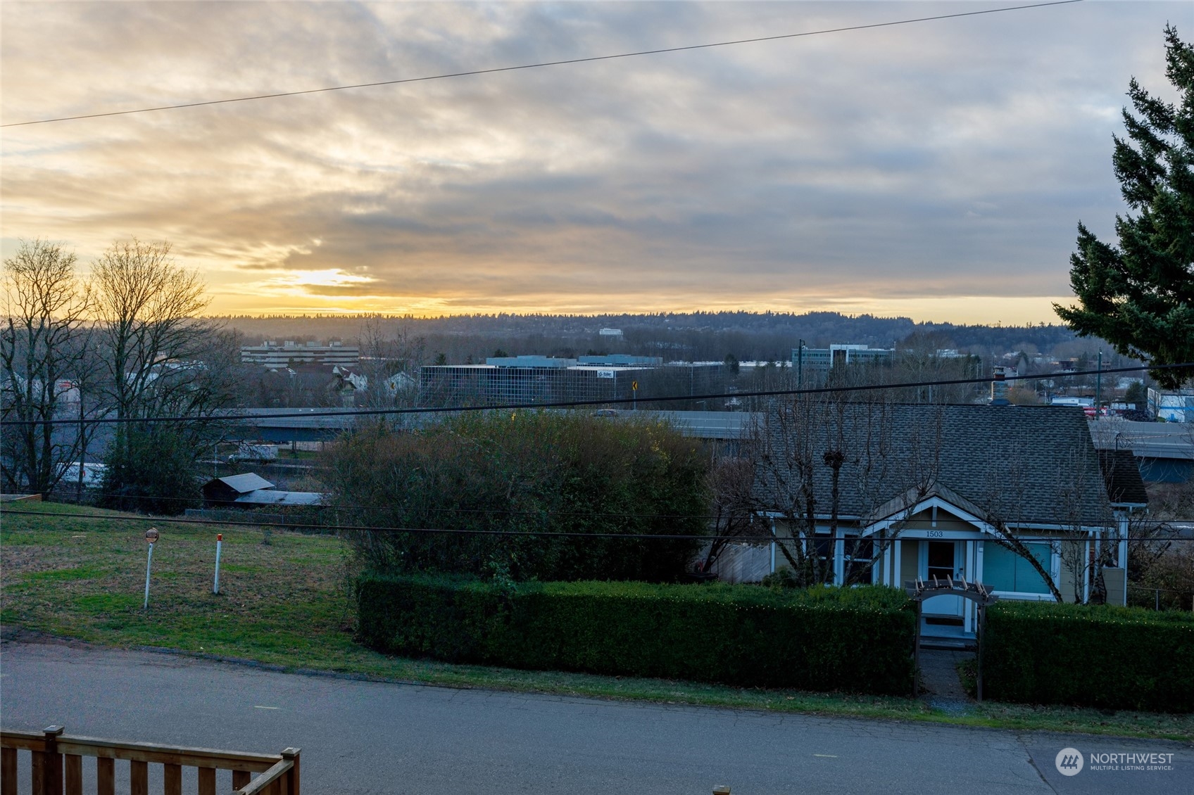 1508 Lake Avenue South Renton, WA 98055 - Photo 20 of 40 a view of a street with a house in the background