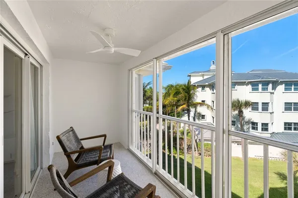 a view of a porch with furniture
