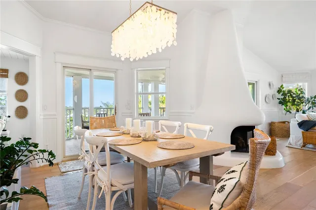 a view of a dining room with furniture and window